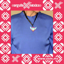Collar Corazón Angelito Turquesa (papel mache). Artesanía mexicana del área del estado de Guanajuato. Dijes fabricados a base de papel maché y pintados a manos, 100% mexicanos. Incluye cadena o listón de satín de 22 cm aprox.